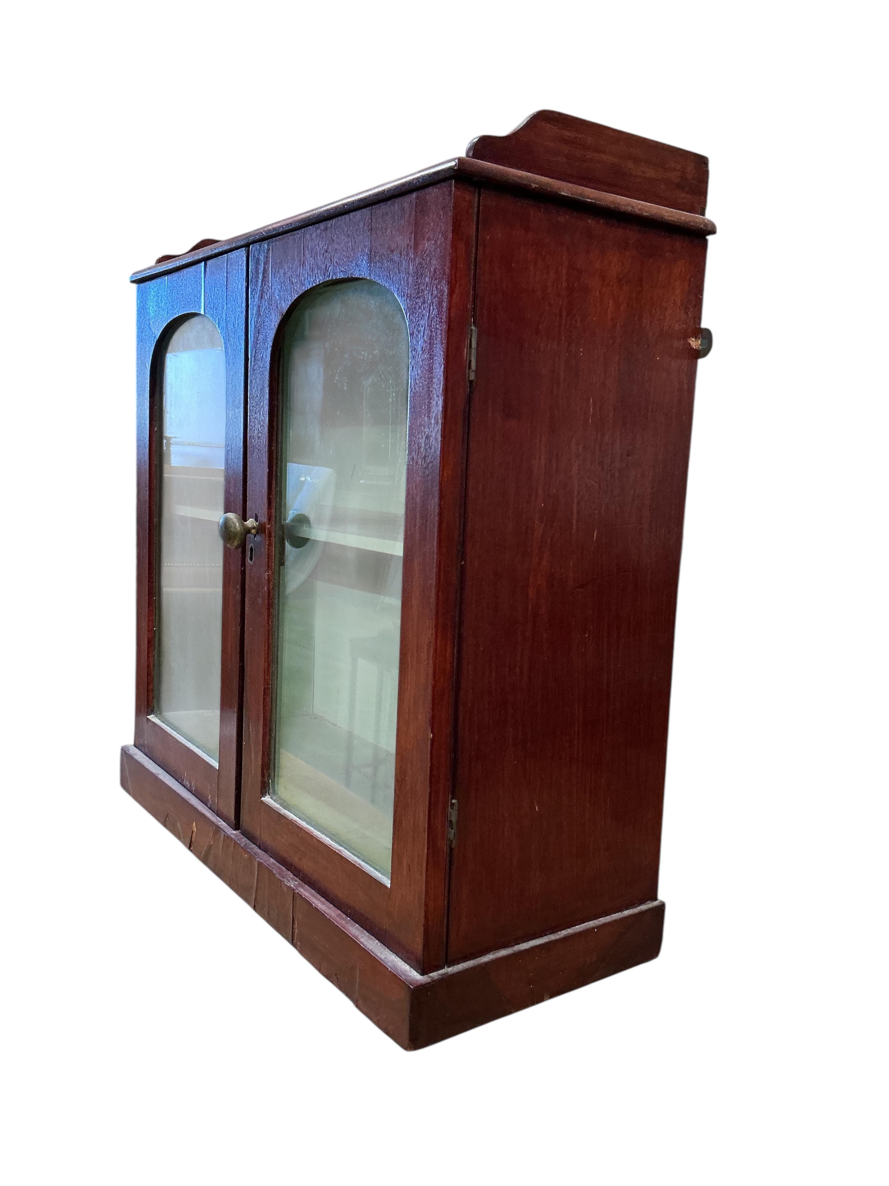 A Victorian mahogany glazed wall cabinet, width 51cm, depth 19cm, height 52cm